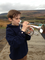 George playing the Last Post